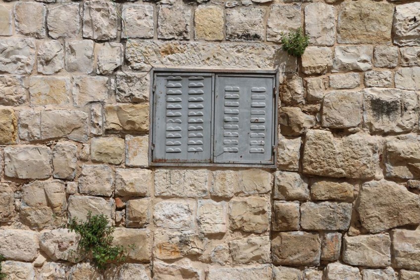 A grey window in an old village